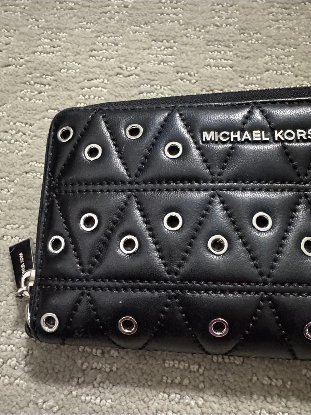 Michael Kors Black Quilted Zip Phone Wallet with Grommet Accents